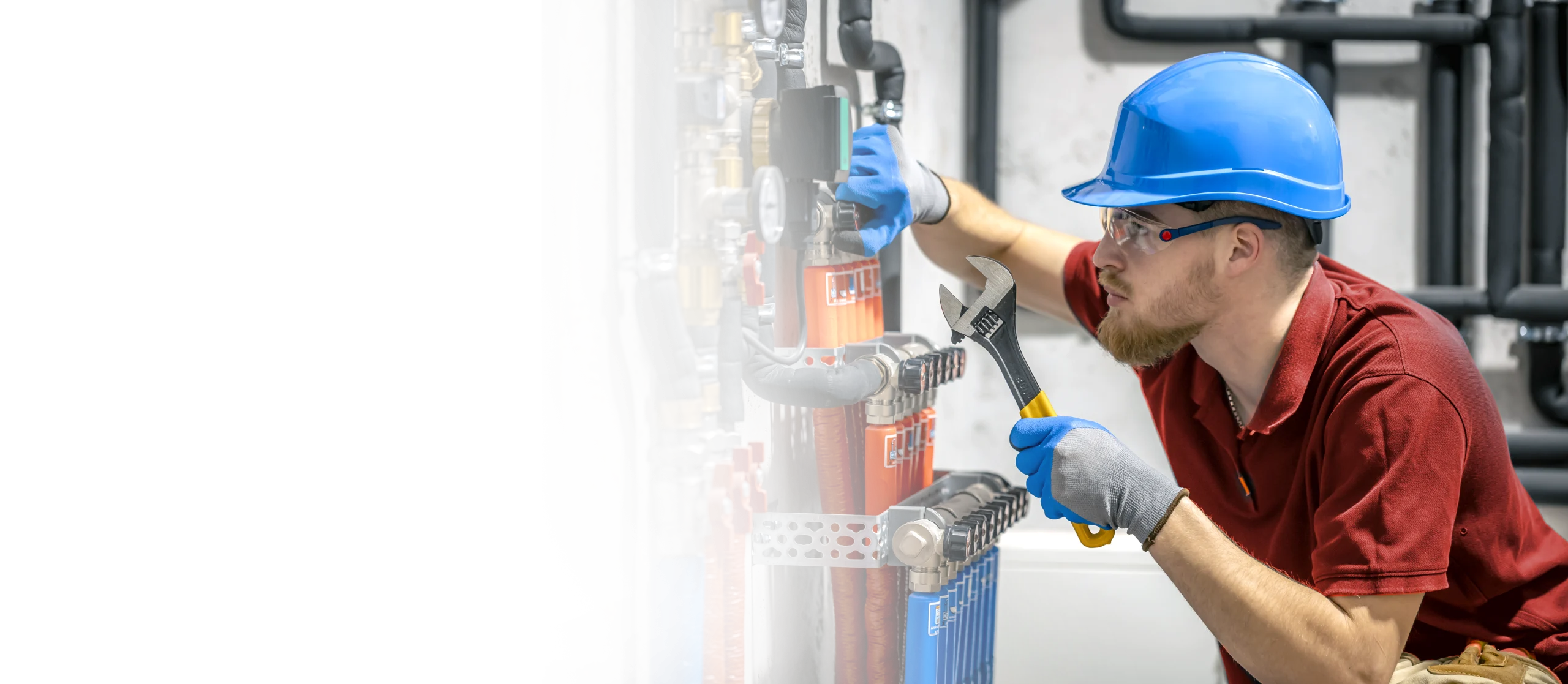 Alberta Indoor Comfort technician performing HVAC maintenance service in a Calgary home Alberta Indoor Comfort technician performing HVAC maintenance service in a Calgary home