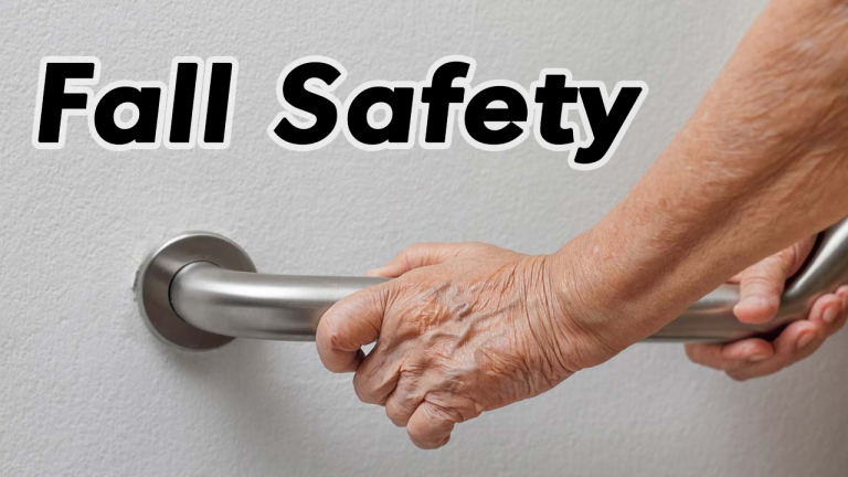An Alberta Indoor Comfort technician fitting a grab bar in a bathroom