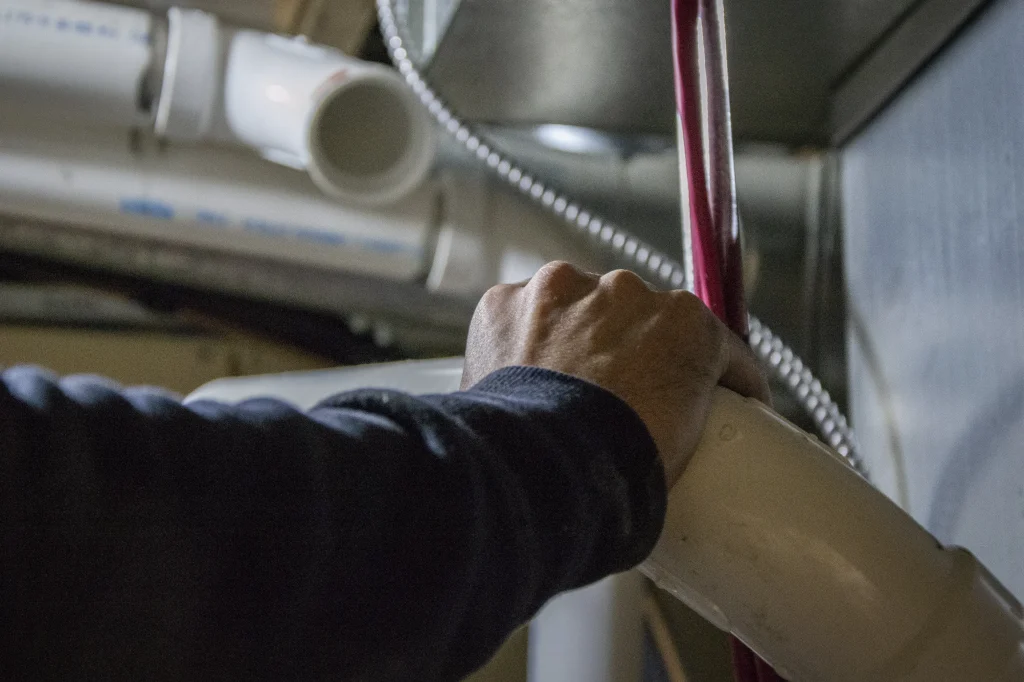 Finishing touches on a Calgary double furnace replacement job