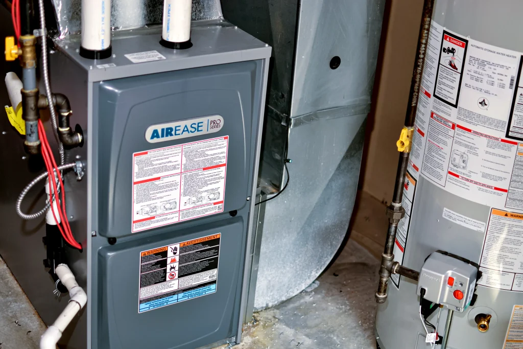 AIC technician completing a single furnace installation in Calgary, 2025